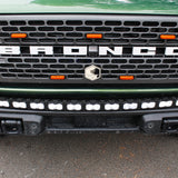 top view of green 2022 bronco capable bumper with white led light bar installed on top for off roading