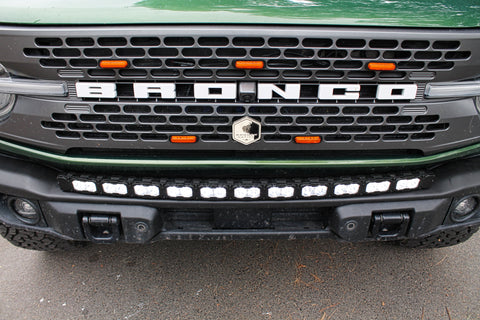 top view of green 2022 bronco capable bumper with white led light bar installed on top for off roading