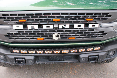 top of view green 2023 bronco capable bumper with led light bar installed on top for off roading