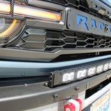 side view ford bronco raptor with white curved led light bar on top of bumpe