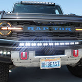 front view ford bronco raptor with white led light bar on bumper and roof plus fog lights