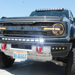  ford bronco raptor with white led light bar on bumper and roof plus fog lights