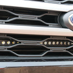 up close view of ford expedition with behind grille led light bar for off roading