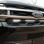 up close view black ford expedition with behind grille led light bar color white for off roading