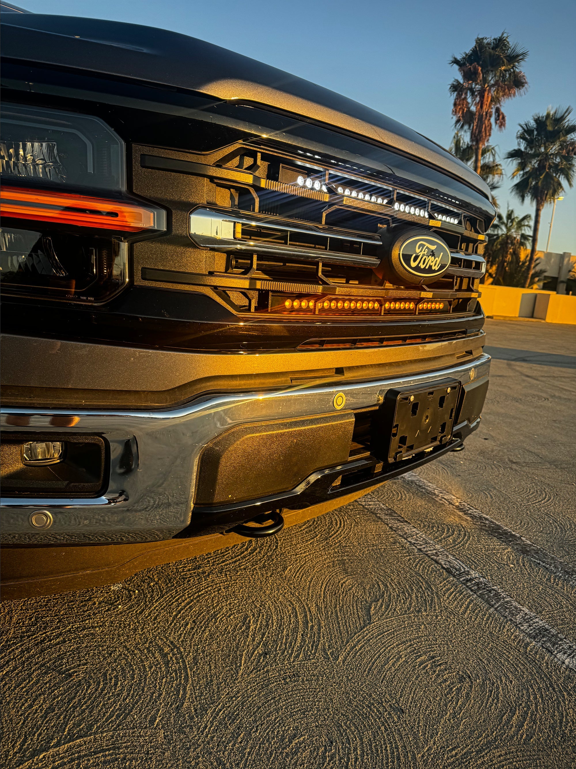 2024+ Ford F150 dual 30in light bars on front grille closeup - Ford emblem, bolt-on installation, no cutting needed, fits 2024-2026 F-150