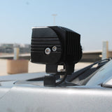 Ford F150 ditch lights mounted on hood with dual-function amber DRL backglow