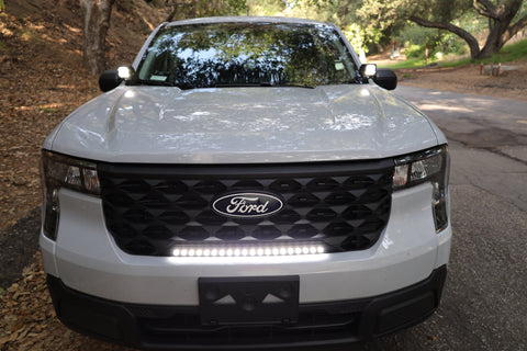 ford maverick light bar 23in installed on 2025 ford maverick front grille showing slim curved LED light upgrade