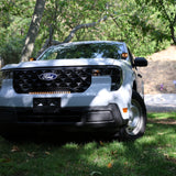 ford maverick light bar installed on 2025 Ford Maverick front grille in park setting