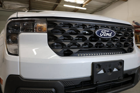 ford maverick light bar 23in installed in lower grille on white 2025 Ford Maverick front bumper view