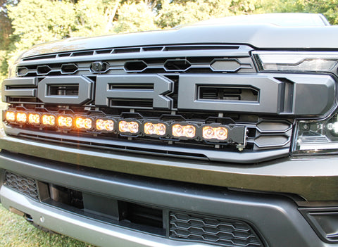 upclose of 2024 ford ranger raptor front of grille LED light bar amber DRL for off roading
