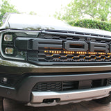 gray ford ranger raptor behind grille LED amber light bar