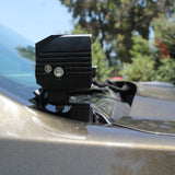 Close-up of 2024 Ford Ranger Raptor hood mount LED light with dual function white and amber DRL backglow.