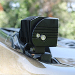 Black LED hood mount light on a 2024 Ford Ranger Raptor, showcasing dual function white and amber backglow.