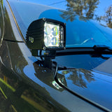2024 Ford Ranger Raptor hood mount ditch light showcasing bright LED and amber backglow for enhanced aesthetics.