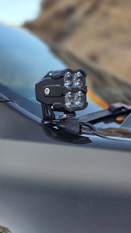 Ranger Raptor ditch lights on a Ford Ranger Raptor with dual white and amber DRL backglow