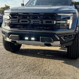 2024+ Ford Raptor Gen 3 Refresh Guard Plate on front of bold Ford truck with illuminated LEDs