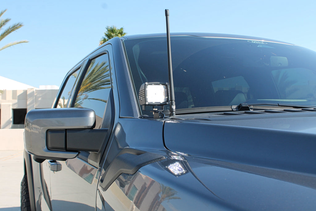 2024+ Ford Raptor ditch lights Gen 3 Refresh A-Pillars on a blue pickup – 2024+ Ford Raptor ditch lights