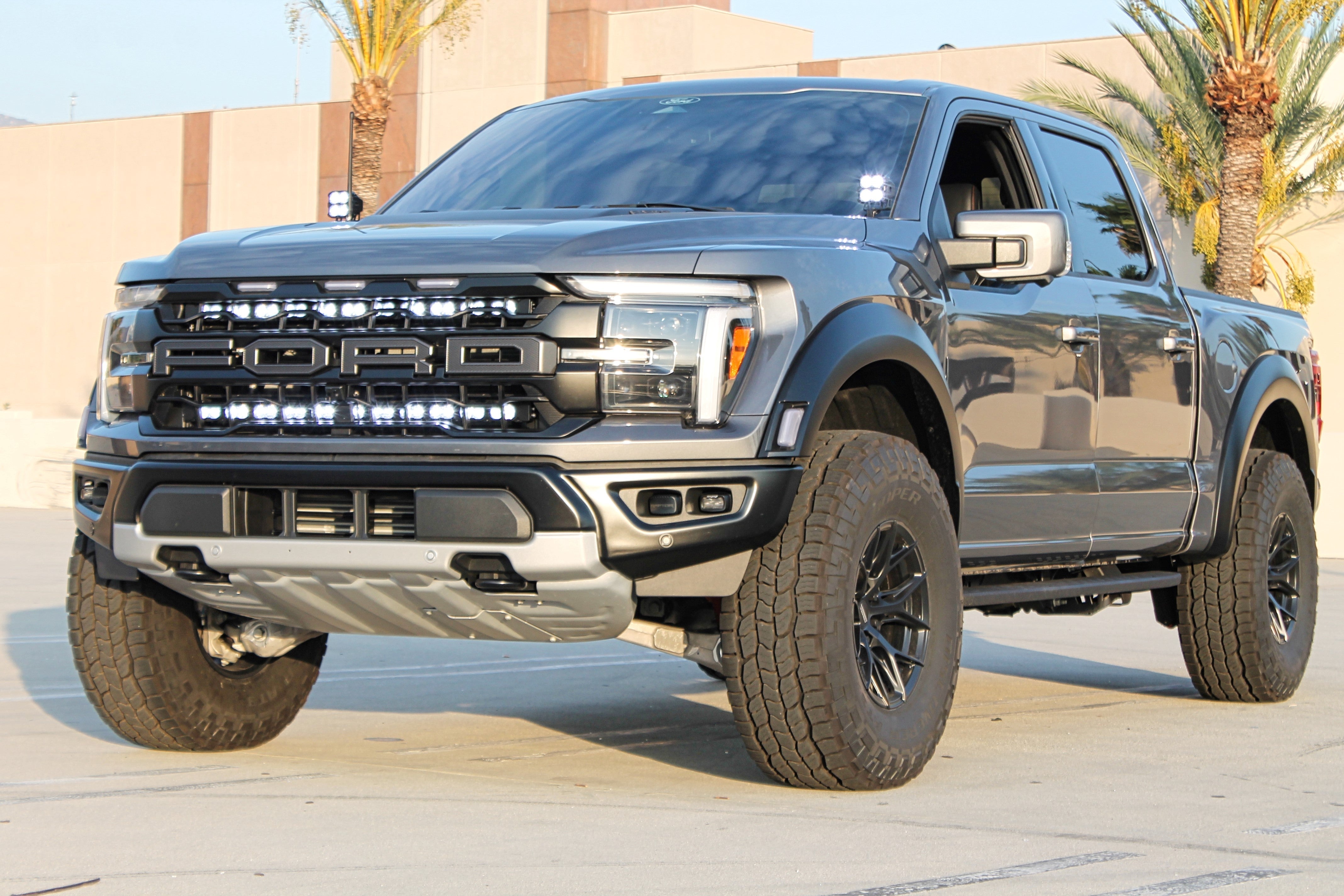 Ford F150 ditch lights on 2024+ Ford F150 with updated headlights and rugged off-road tires