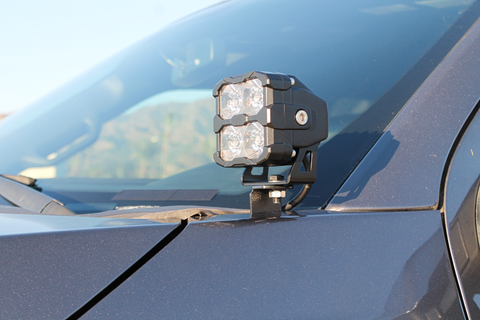 Ford Super Duty Ditch Lights PRO mounted on 2023+ F250/350/450 driver side cowl for enhanced off-road side lighting