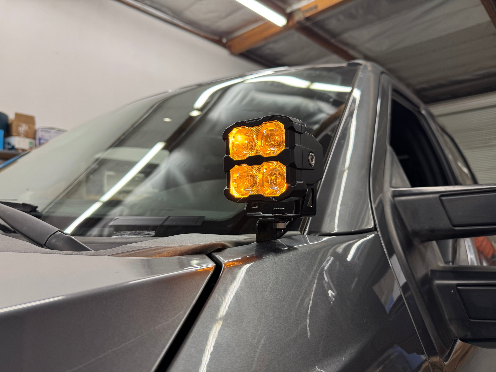 Ford Super Duty Ditch Lights PRO 2023+ F250/350/450 mounted on driver side cowl with amber LED pods