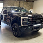 Ford Super Duty Ditch Lights PRO installed on 2023 Ford Super Duty F250 truck front view in garage