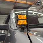 Ford Super Duty Ditch Lights PRO 2023+ F250/350/450 mounted on mirror with amber LED pods illuminated