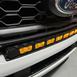 curved 40in LED light bar installed on top of 2023 2024 ford superduty with amber day time running lights
