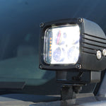 Ford Super Duty ditch lights on 2020-2022 F250/F350/F450 — rugged auxiliary LED spotlight mounted on windshield, off-road ready