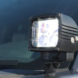 Ford Super Duty ditch lights on 2020-2022 F250/F350/F450 — rugged auxiliary LED spotlight mounted on windshield, off-road ready