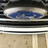 up close curved LED light bar on top bumper ford superduty