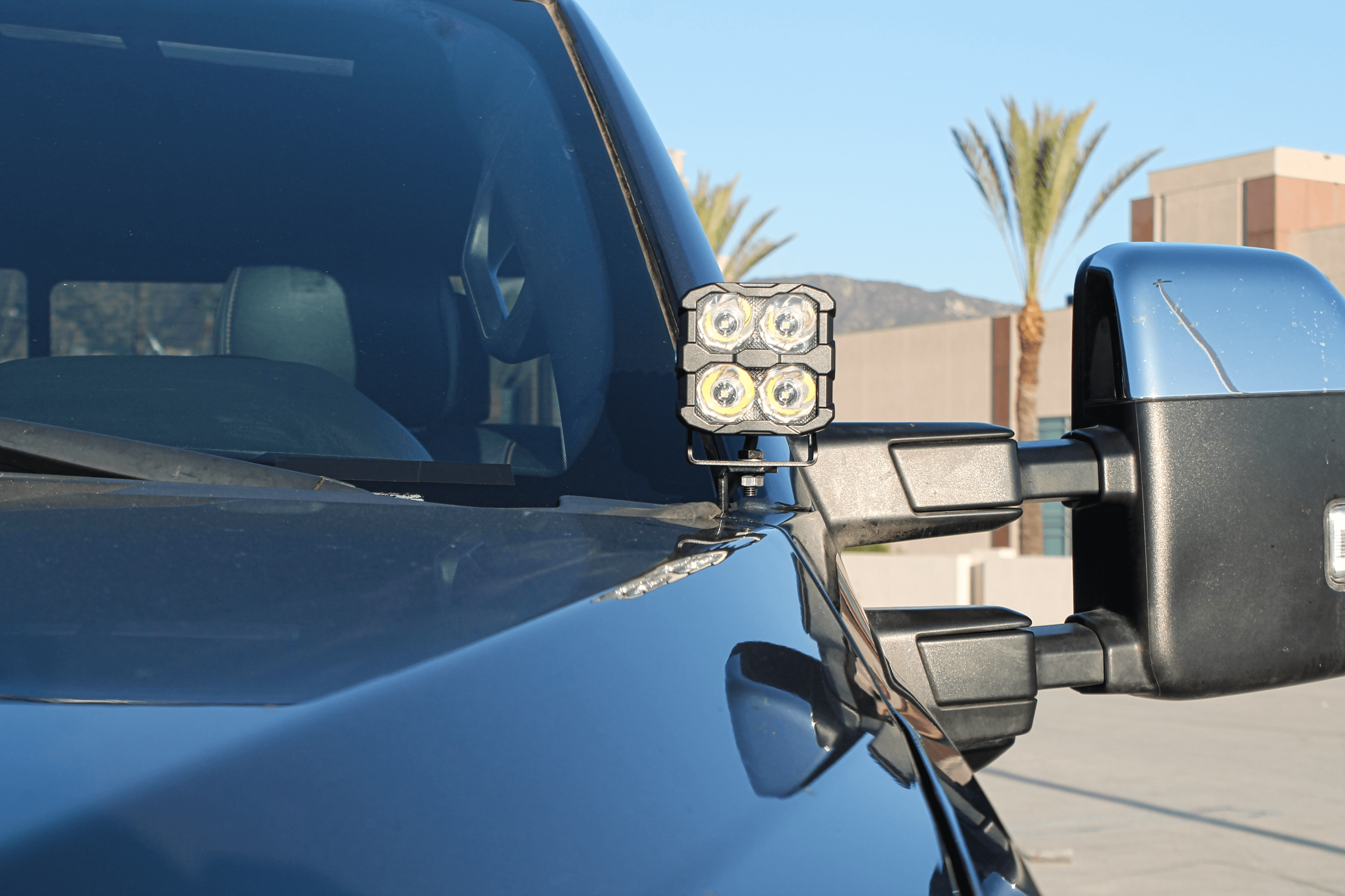 Ford Super Duty ditch lights mounted on side mirror with dual LED cubes for 2020-2022 F-250 F-350 F-450 trucks