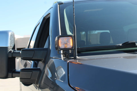 Ford Super Duty ditch lights featured on 2020-2022 F250/F350/F450 line-up showcasing aftermarket auxiliary lighting on a rugged truck