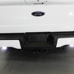 white 2023 2024 ford superduty with white reverse LED light kit on 