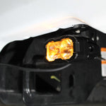 Ford Super Duty reverse light - forward-facing under-vehicle view showing orange flood-style pod light for 2020-2022 F250/F350/F450 with pair kit