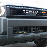 Land Cruiser lightbar on 2024+ Toyota Land Cruiser with front grille removed for install, showcasing install behind lower grille and radiator airflow unaffected