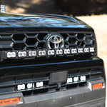 4Runner Light Bar installed on front grille of black 2025 Toyota 4Runner TRD, curved 40in LED light bar PRO close-up