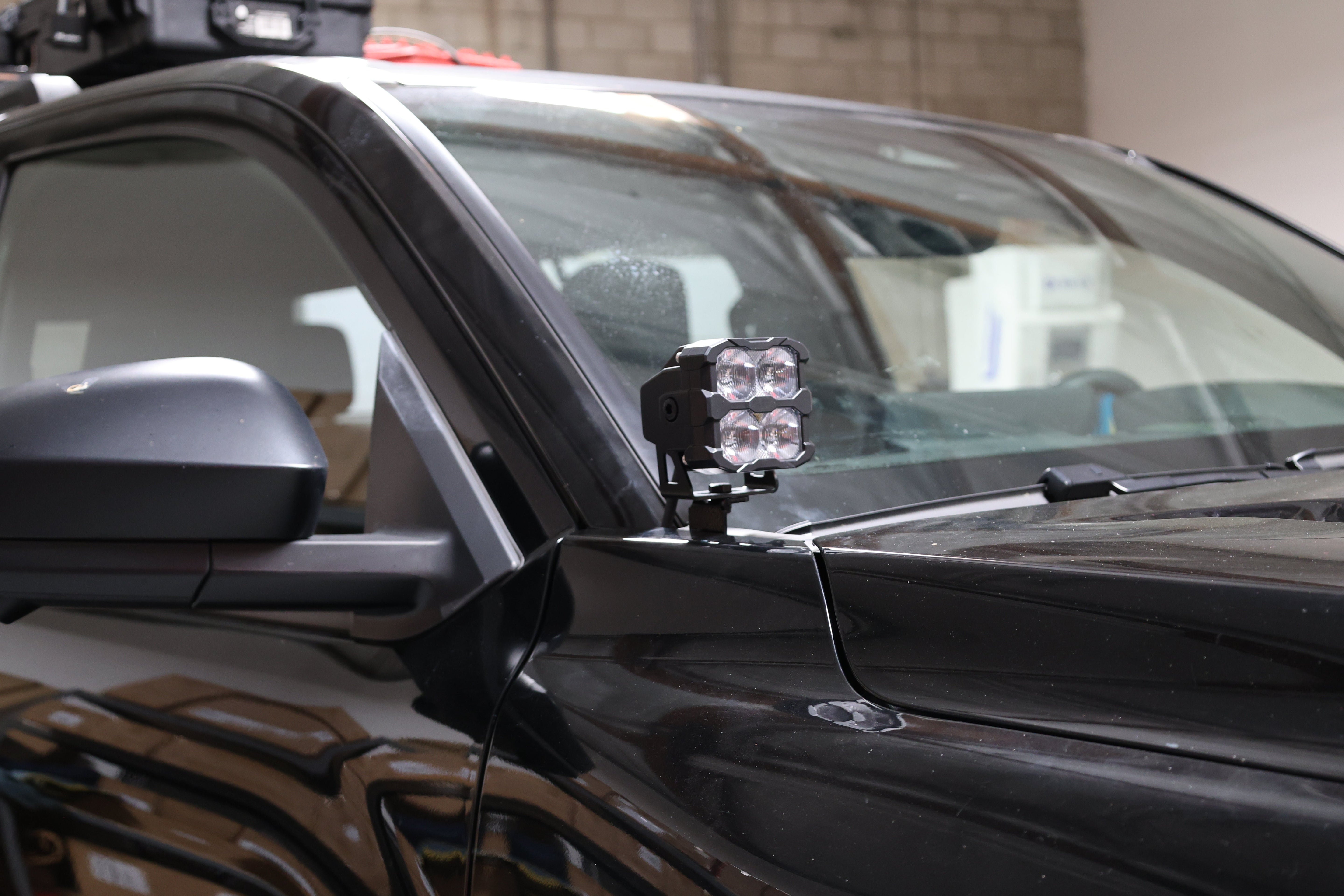 4Runner Ditch lights dual color LED installed on 2025 Toyota 4Runner driver side hood mount