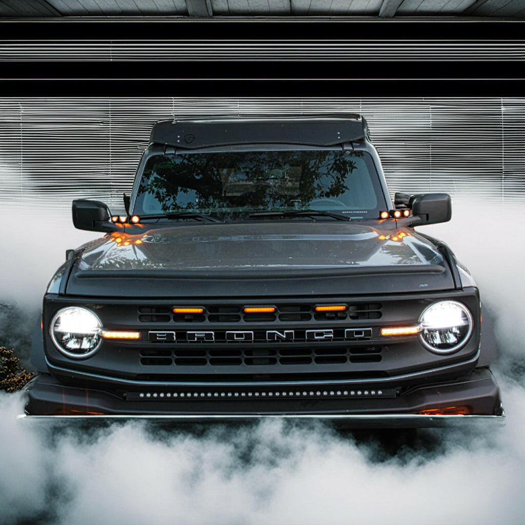 gray ford bronco with ditch lights of 3 amber led pods on each side