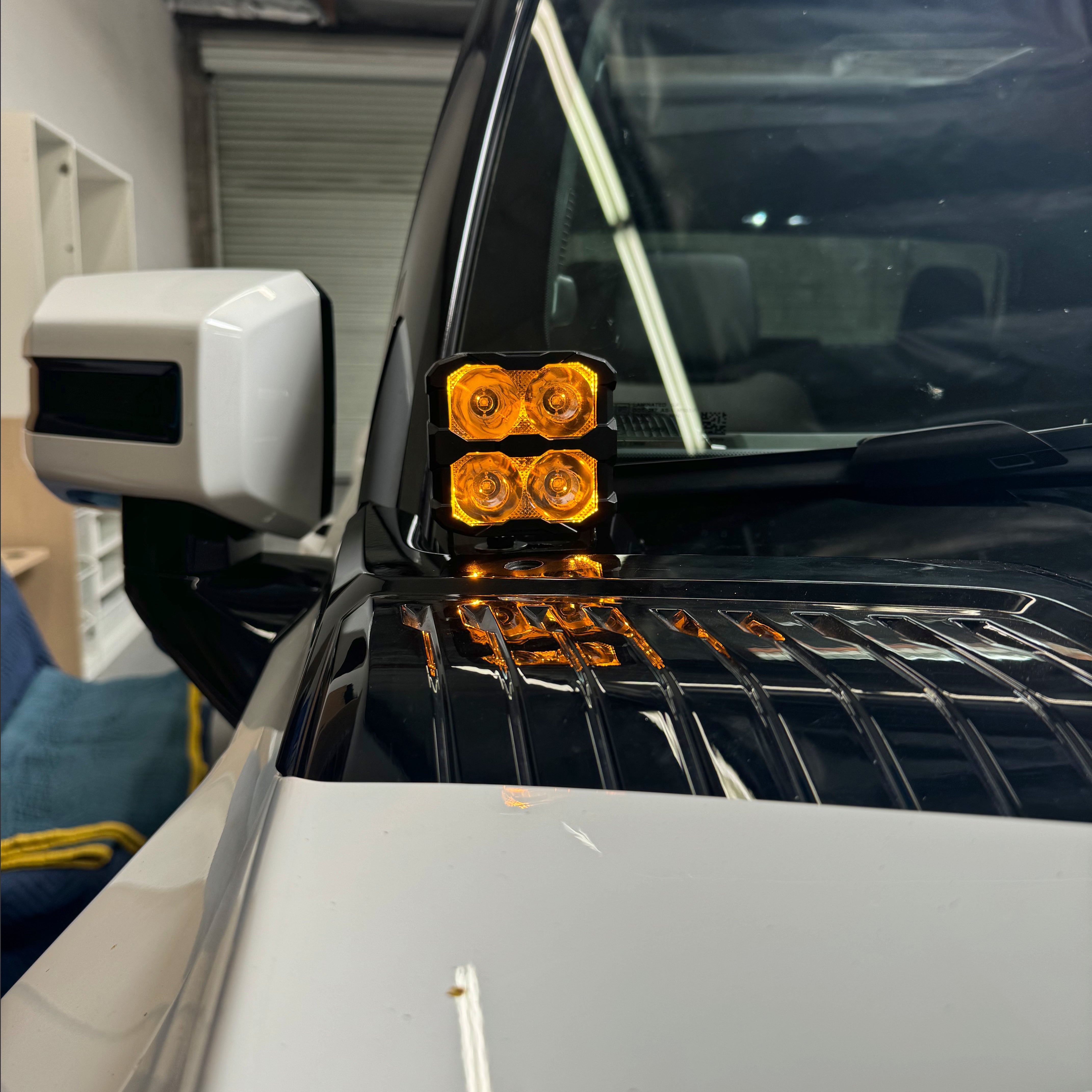 Hummer EV ditch lights PRO 2022+ on truck with metal bracket, orange LEDs, adjustable ditch light pods for GMC Hummer EV