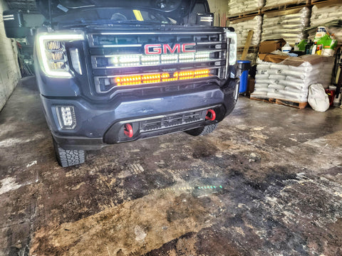 2020 2021 2022 2023 black GMC Sierra 2500 and 3500HD two 40in Light Bars behind the grille color amber and white 