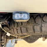 Sierra HD Reverse kit pod pair on GMC Sierra 2500/3500 HD with white LEDs and amber or red backlight option, fits 2020-2026 models