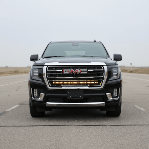 2021-2024 GMC Yukon with a single 40in SLIM light bar installed on the grille, showcasing its sleek front view.