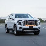 2026 white gmc yukon with led light bars behind grille for off roading