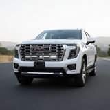 2025 white gmc yukon with led light bars behind grille for off roading