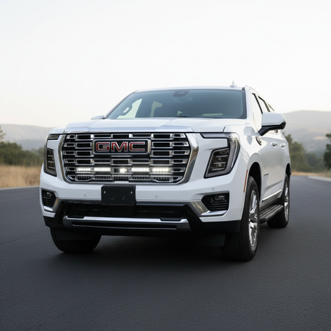 2025 white gmc yukon with led light bars behind grille for off roading