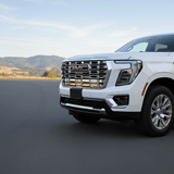 2025 2026 GMC Yukon front grille with dual 40s slim light bars mounted cleanly under GMC logo