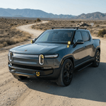 gray 2025 rivian with ditch lights for off roading 