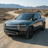 gray 2025 rivian with ditch lights for off roading 