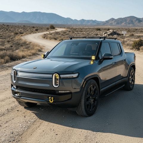 gray 2025 rivian with ditch lights for off roading 