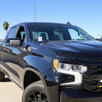Silverado 1500 ditch lights PRO dual-color LED ditch lights mounted on 2022+ Chevrolet Silverado 1500 black truck front view